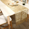 A beige patterned waterproof hollow table runner displayed on a white dining table.