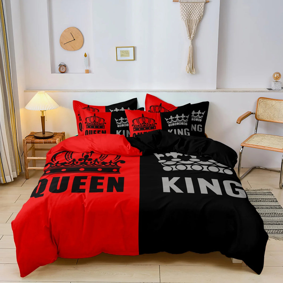 A set of three black and grey couple themed duvet covers displayed on a bed.