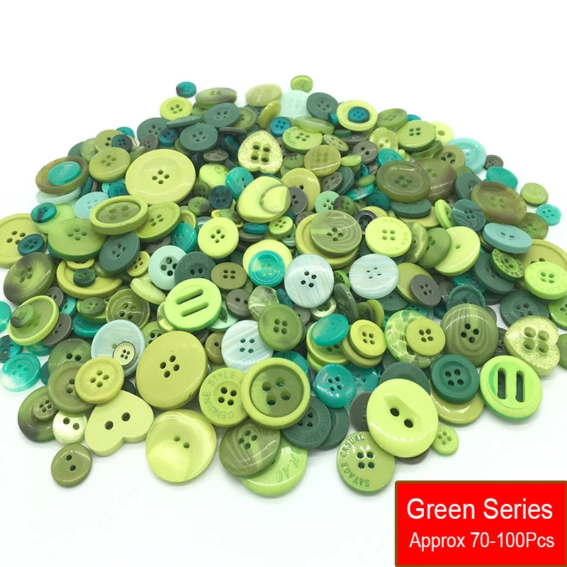 A pile of assorted resin sewing buttons in various shades of green and yellow.
