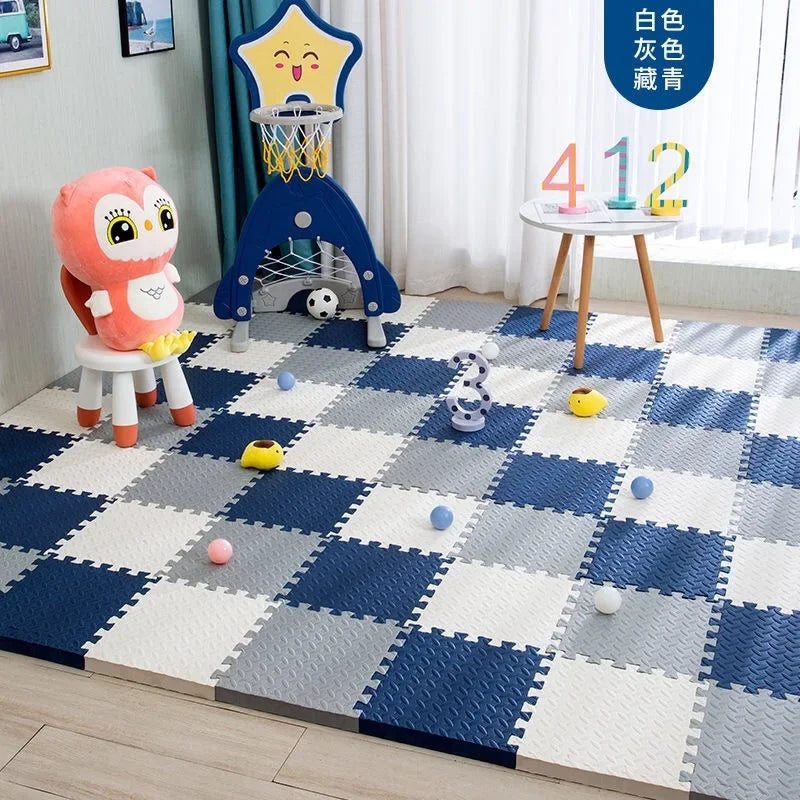 A soft interlocking foam play mat featuring a blue and white checkered pattern with colorful balls and a star-shaped toy.