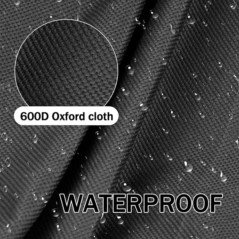 Close-up of a black waterproof Oxford cloth material with water droplets on a fabric surface.