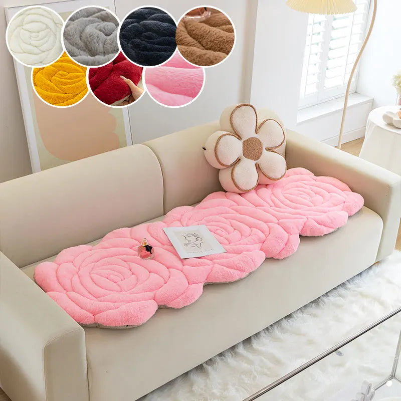 A pink textured mat is placed on a beige sofa, surrounded by color swatches.