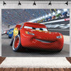 A red cartoon race car is featured in a dynamic shot against a blurred racetrack background.