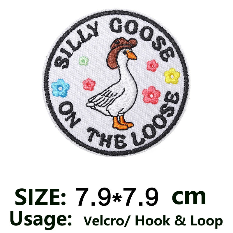 Embroidered patch featuring a goose and text that reads Silly Goose on the Loose hook and loop style