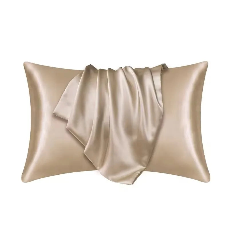 A luxurious champagne satin pillowcase draped elegantly.