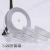 Roll of silver glitter organza ribbon for gift wrapping and DIY crafts