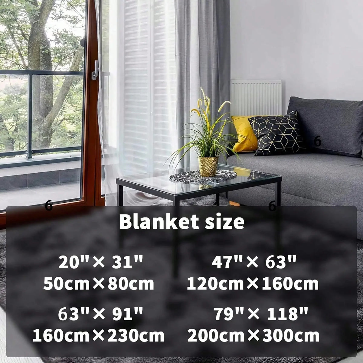 A collection of various sized blankets and rugs displayed on a dark surface.