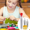A young girl is using a stainless steel embroidery and knitting needle set on a green fabric.
