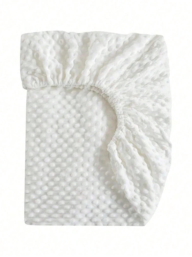 White soft plush mattress and diaper changing cover with ruffled edges