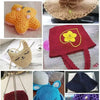 A collection of crochet items including a yellow bear, a red hat with a yellow flower, and various knitted or crocheted acces