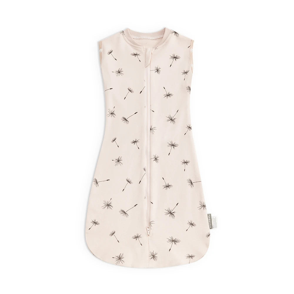 A light beige soft cotton baby sleeping bag or swaddle with small, scattered floral embroidery.