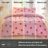 Pink strawberry print duvet cover set displayed in dim, warm, cold, and natural light settings.