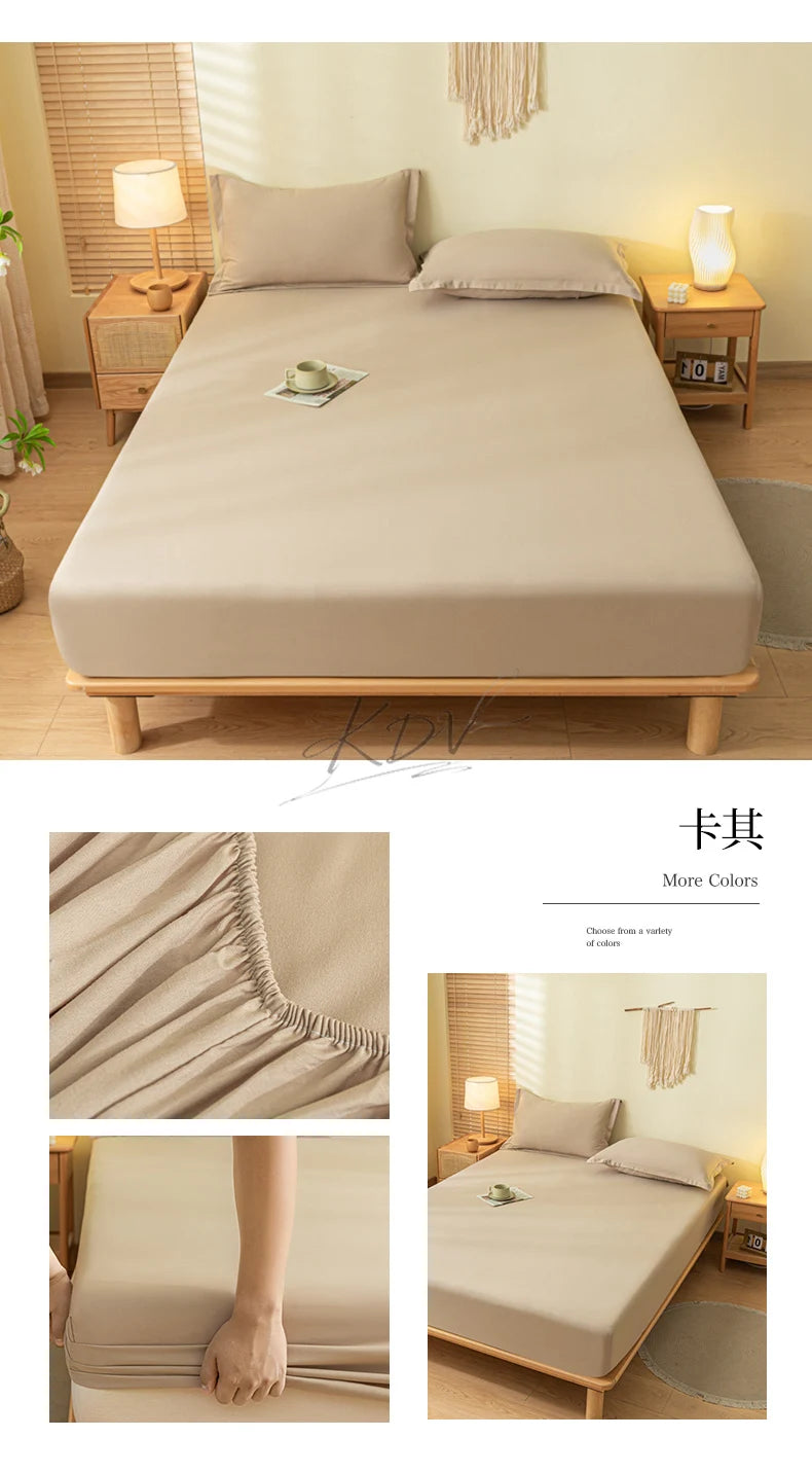 A beige fitted sheet set and pillow displayed on a wooden bed frame with natural light.