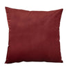 A deep burgundy velvet throw pillow cover resting on a white background.