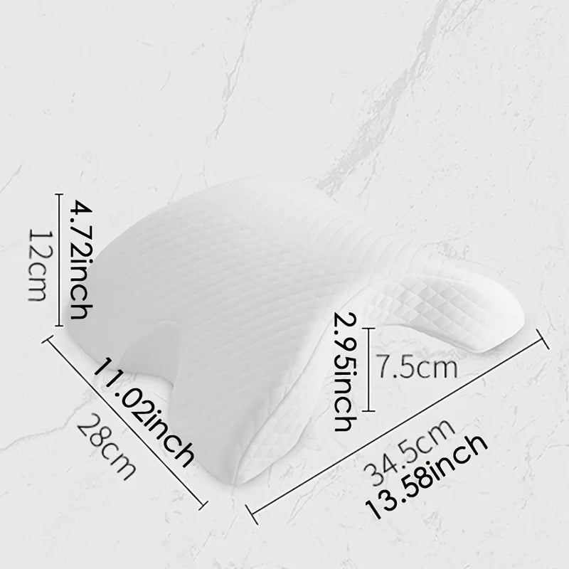 A white arched memory foam cuddle pillow shown with dimensions and support areas.