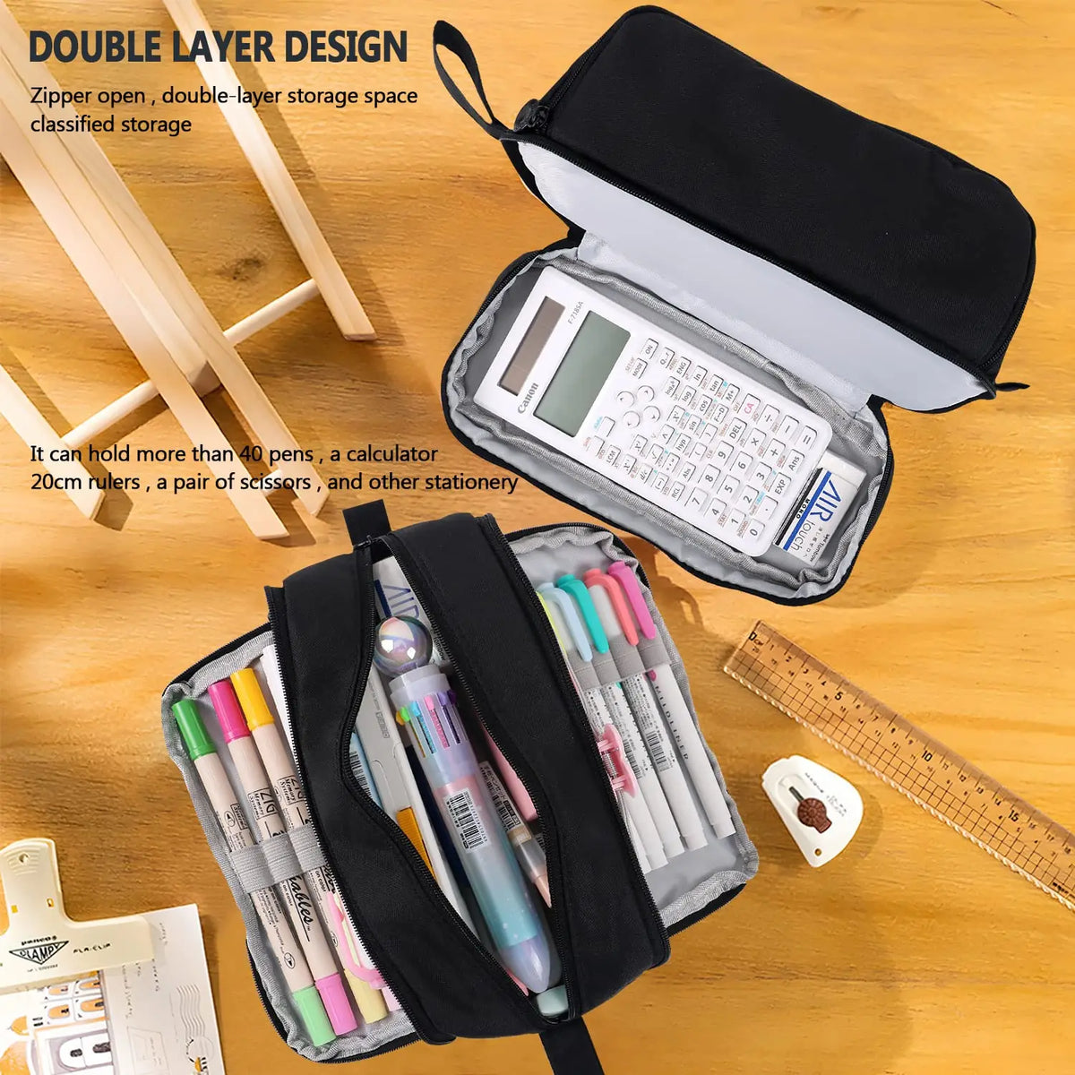 A black double-layer fabric pencil pouch is shown open, revealing various pens and stationery inside.
