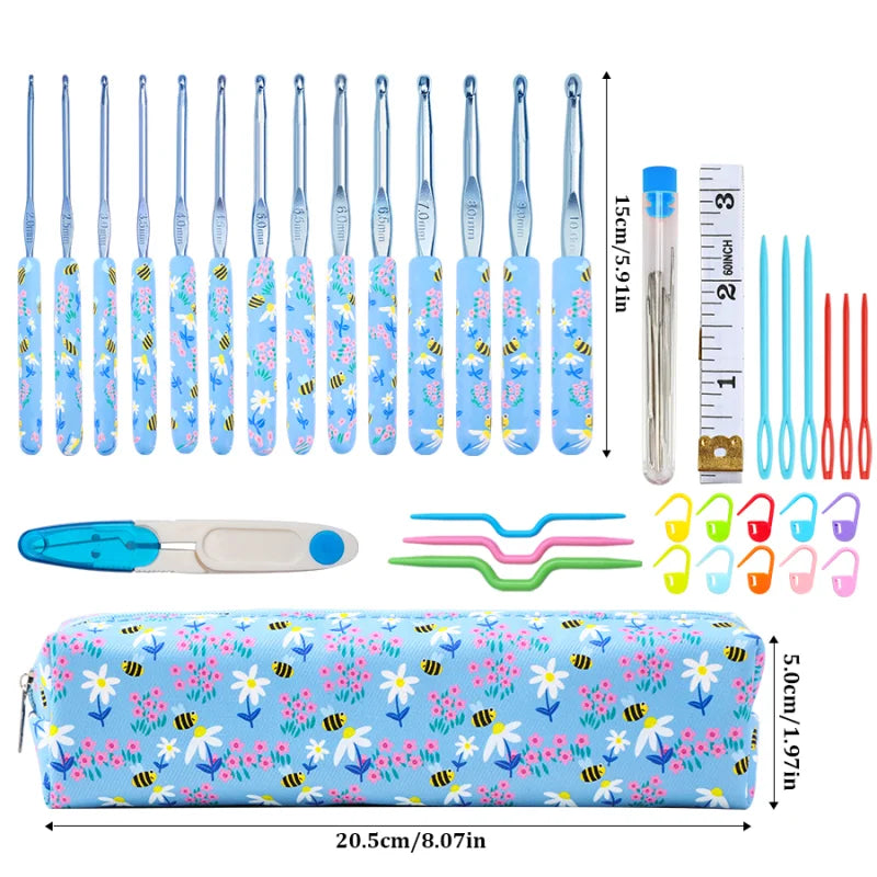 A set of ergonomic crochet hooks in various sizes and colors packaged with a blue floral patterned carrying case.