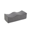 A gray ergonomic memory foam leg support pillow.