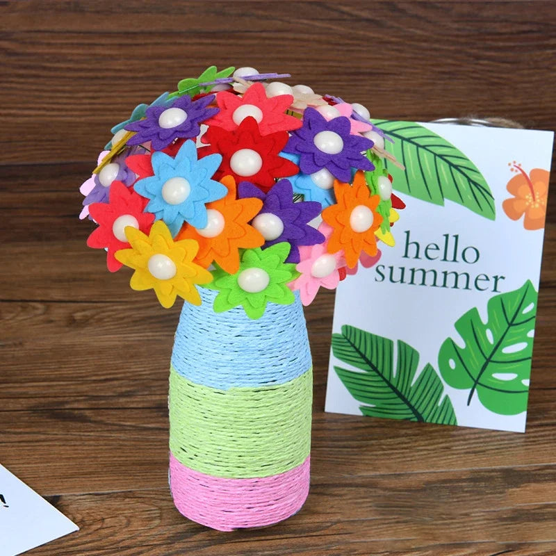 A bouquet of colorful felt flowers in various shades of purple, orange, yellow, and blue displayed in a cylindrical vase.