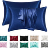 A set of satin pillowcases in various shades of blue, red, black, and white.