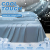 A blue cooling fitted sheet is shown on a bed, emphasizing cool touch and comfort features.