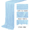 Light blue boho gauze table runner showing soft texture, sheer fabric, and clean edge details.