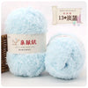 A fluffy light blue velvet yarn ball used for crafting and knitting.