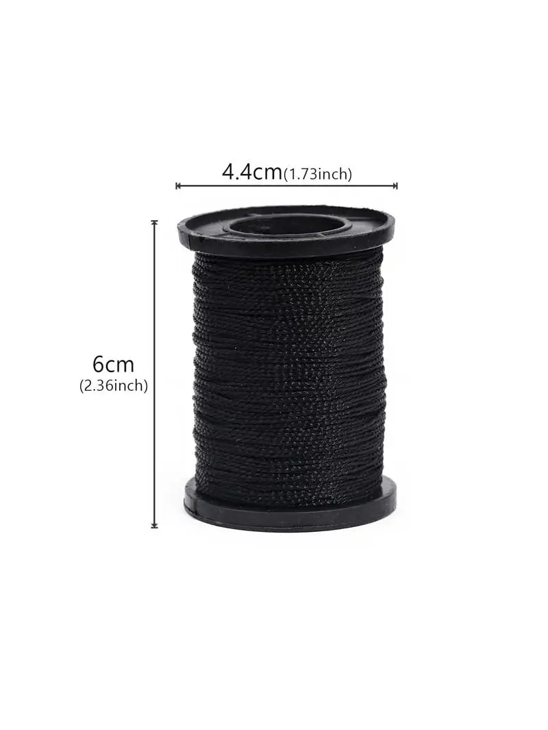 Black spool of leather sewing awl and stitching kit wire