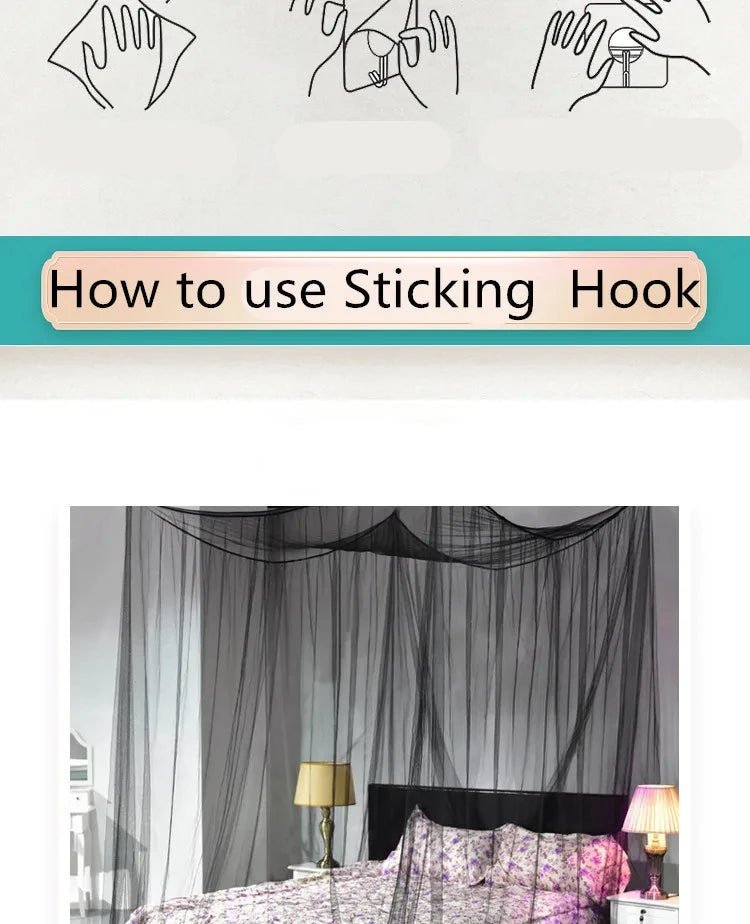 A large four-door mosquito net is draped over a bed, showing its sheer black fabric.