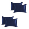 A set of two dark navy satin silk pillowcases.