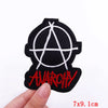 Black embroidered patch featuring a white anarchist symbol and the word ANARCHY in red script