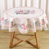 Vintage pink rose sunflower floral tablecloth displayed on a wooden table stand.