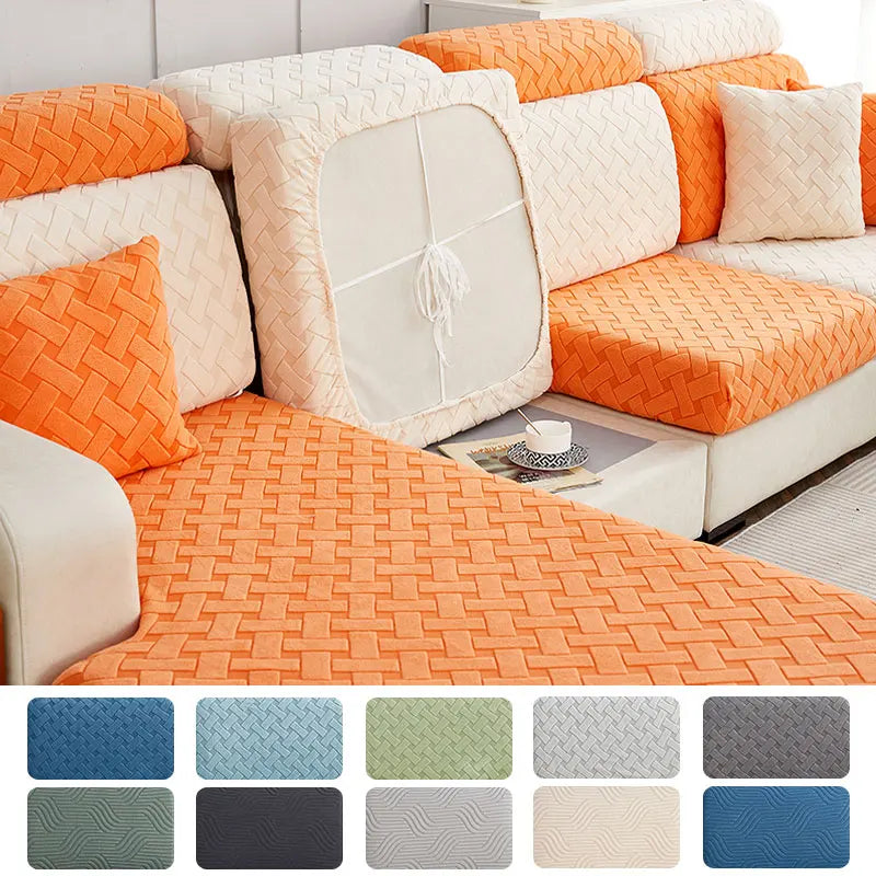 A collection of square and rectangular plush sofa cushion covers in orange, cream, and gray tones.