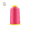 A spool of bright pink embroidery thread with a yellow core.