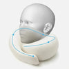 A white memory foam travel neck pillow demonstrating its contoured shape for neck support.