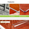 Close-up of a transparent PVC table protector mat with a polished finish on a wooden surface.