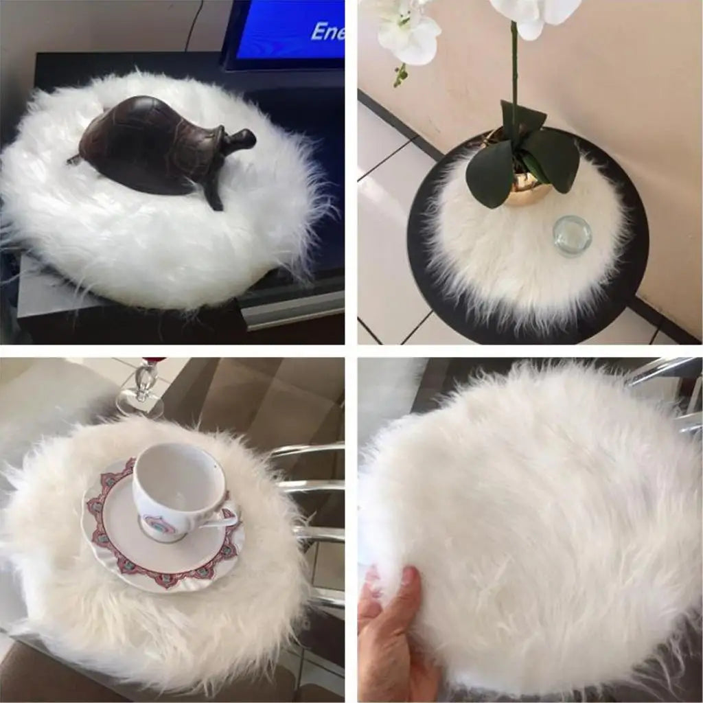 A round white faux fur sheepskin rug with a dark brown object and a small teacup placed on it.
