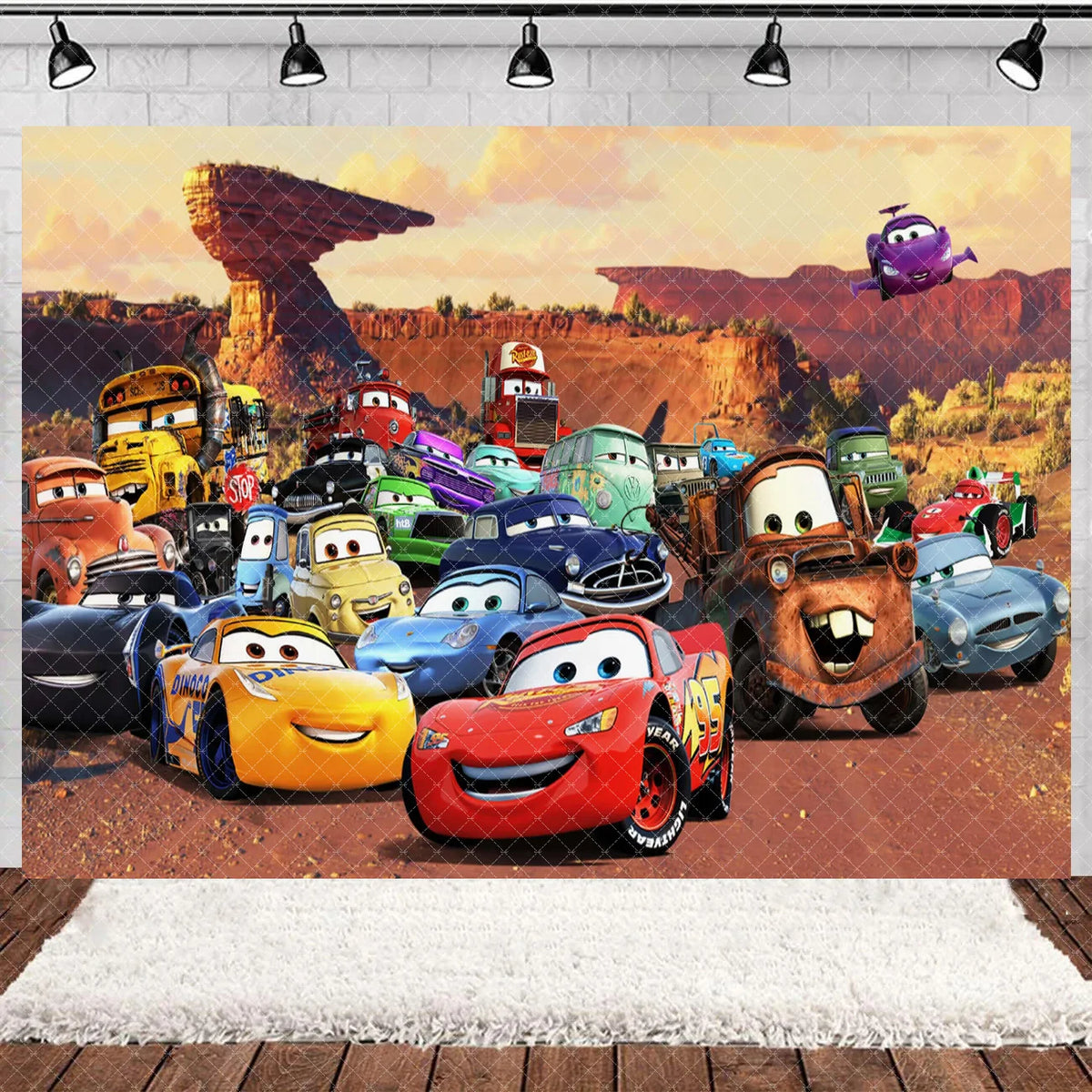 A colorful backdrop featuring various cartoon race cars and a purple alien in a desert landscape.