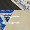 A close-up view of a semi-circular mosaic non-slip floor mat with vintage floral print texture and edges.