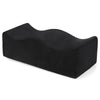 Black ergonomic seat cushion designed for tailbone relief and hip support.