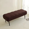 A dark brown elastic jacquard bench cover used as protection for seating.