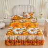 A floral ruffle bed skirt set featuring orange and white sunflowers and bees on a yellow background.