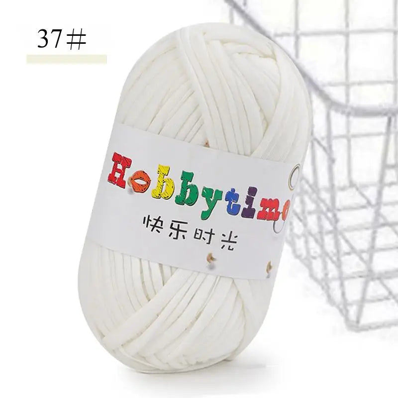 A ball of white thick polyester craft yarn for knitting and crochet