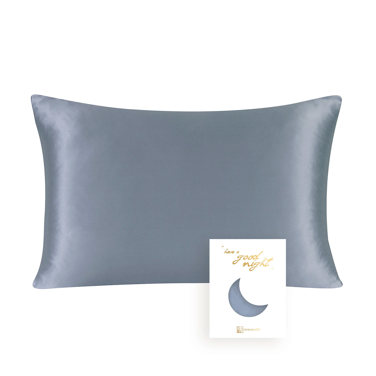 A smooth, slate gray silk pillowcase with a hidden zipper and a crescent moon design.