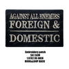 Black embroidered patch with white text reading AGAINST ALL ENEMIES FOREIGN & DOMESTIC