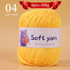 A ball of soft yellow yarn labeled as 6 pieces equal to 300 grams for handmade knitting thread.