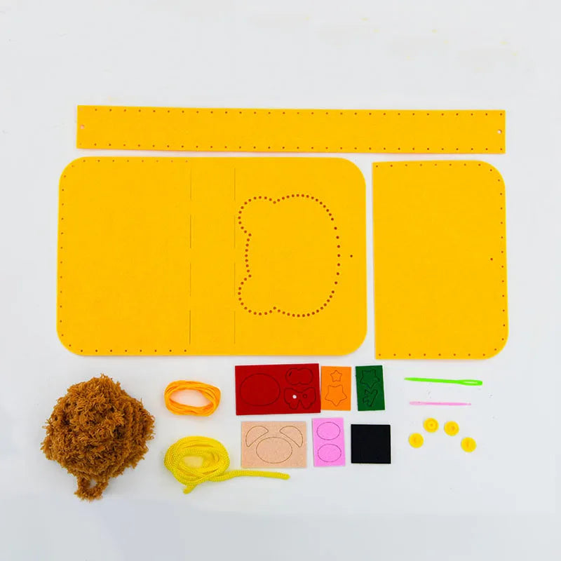 A yellow felt animal craft kit showing various felt shapes and pieces for beginner crafting.