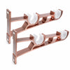 Two rose gold heavy duty curtain rod brackets with white curved supports.