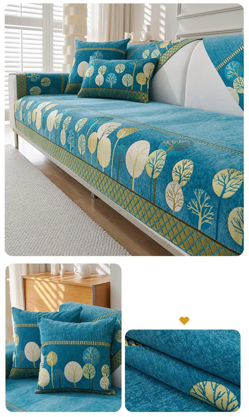 A teal jacquard sofa seat and back cover featuring a botanical pattern of yellow and green leaves on a white background.