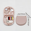 A pink portable DIY sewing box containing various sewing tools and accessories.